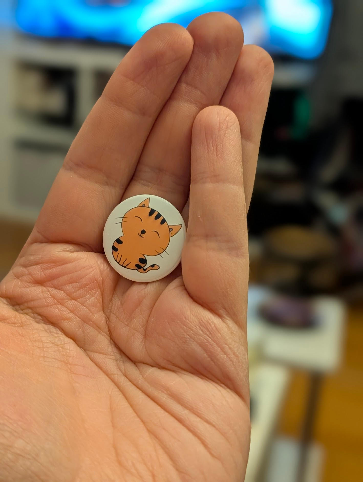 Finished badges arranged in a display