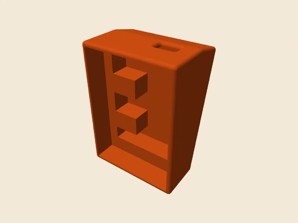 A render of the emailkb case in orange on a cream background, an angled stand with two clip features inside it
